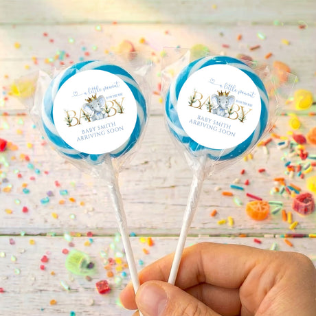 Baby shower lollipop pair with round blue-edged baby arrival labels