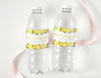 Personalised lemon baby shower drink bottle labels on clear plastic bottles