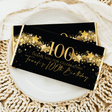 Black 100th birthday chocolate bar wrapper with gold stars and “Thanks for celebrating”