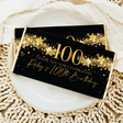 Black birthday chocolate bar with gold stars and 100 text