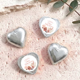 Silver foil heart chocolates with “Baby Shower” label and rose floral design