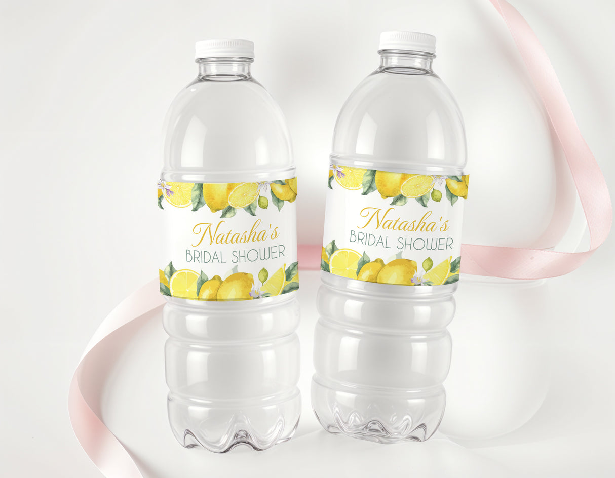 Two clear water bottles with white caps and lemon bridal shower labels for Natasha's