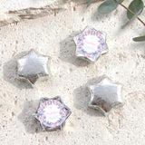 Silver foil star chocolates with butterfly label, five pieces