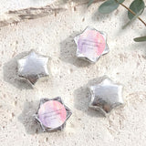 Personalised foil-wrapped chocolate star chocolates in silver, four star shapes
