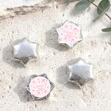 Silver foil star chocolates with Luna's First Birthday label
