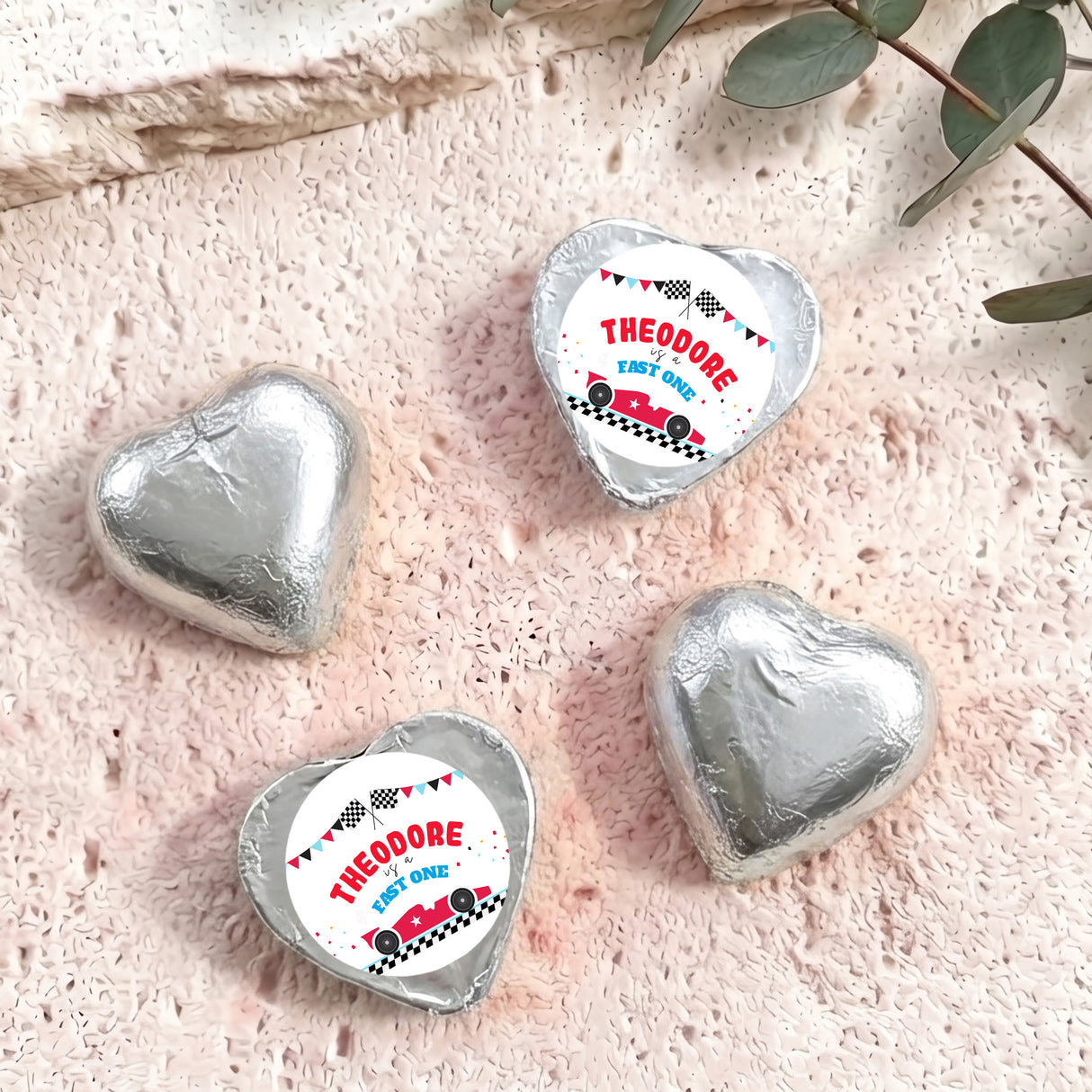Foil-covered chocolate hearts, silver foil with white Theodore label