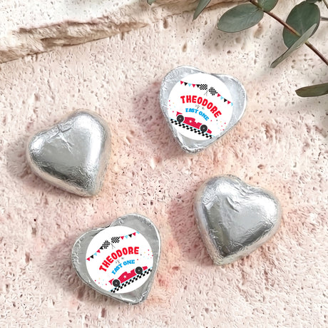 Foil-covered chocolate hearts, silver foil with white Theodore label