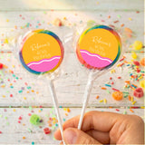 Personalised 40th birthday lollipops with multicolored rim wrappers and yellow-pink round labels