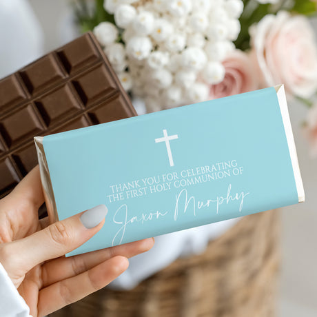 Light blue First Communion chocolate bar with cross and thank-you message on wrapper