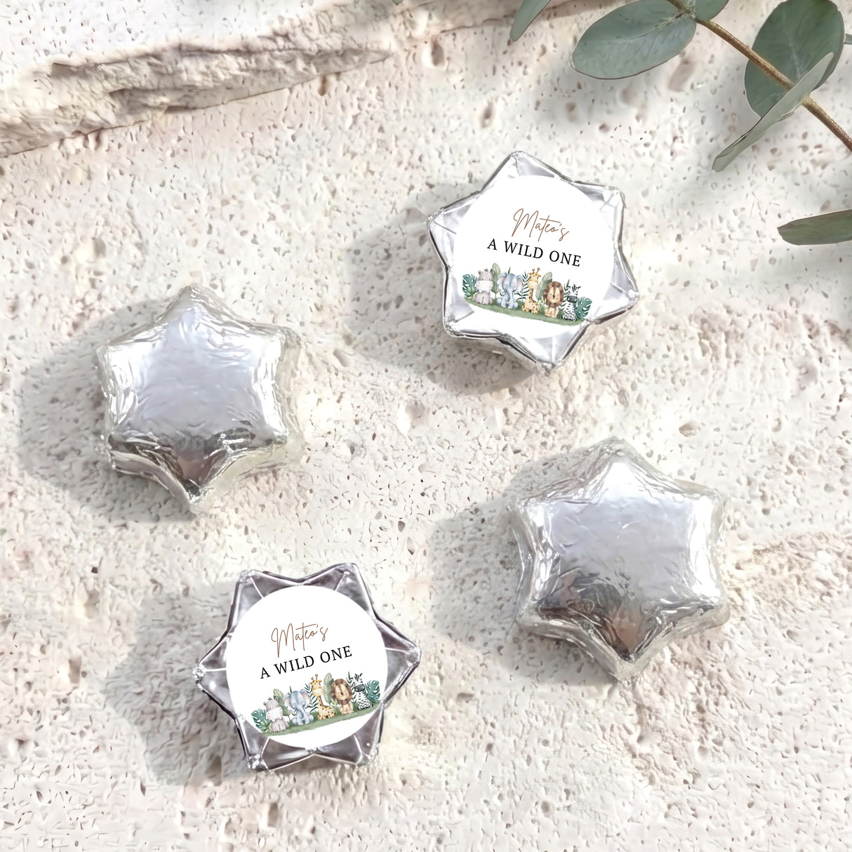 Foil-covered chocolate stars with 'A WILD ONE' labels, silver foil star chocolates