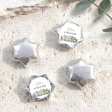 Foil-covered chocolate stars with 'A WILD ONE' labels, silver foil star chocolates