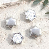 Foil-covered star chocolates with personalized label, silver foil stars