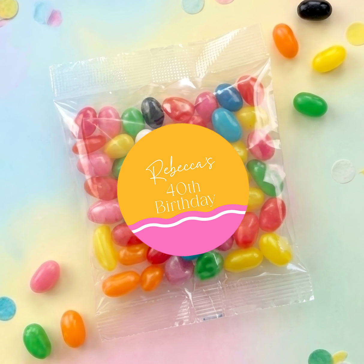 Personalised jelly bean bag with wavy multicolored candies and pink name label