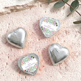Silver foil-covered chocolate hearts, three hearts with personalised First Holy Communion label