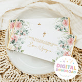 White chocolate bar wrapper with pink cream floral roses, green leaves, and gold crosses