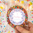 Confirmation giant freckles treat with multicolor sprinkle ring and purple floral card