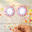 Butterfly-themed confirmation lollipops with pink ribbon bows and round printed labels
