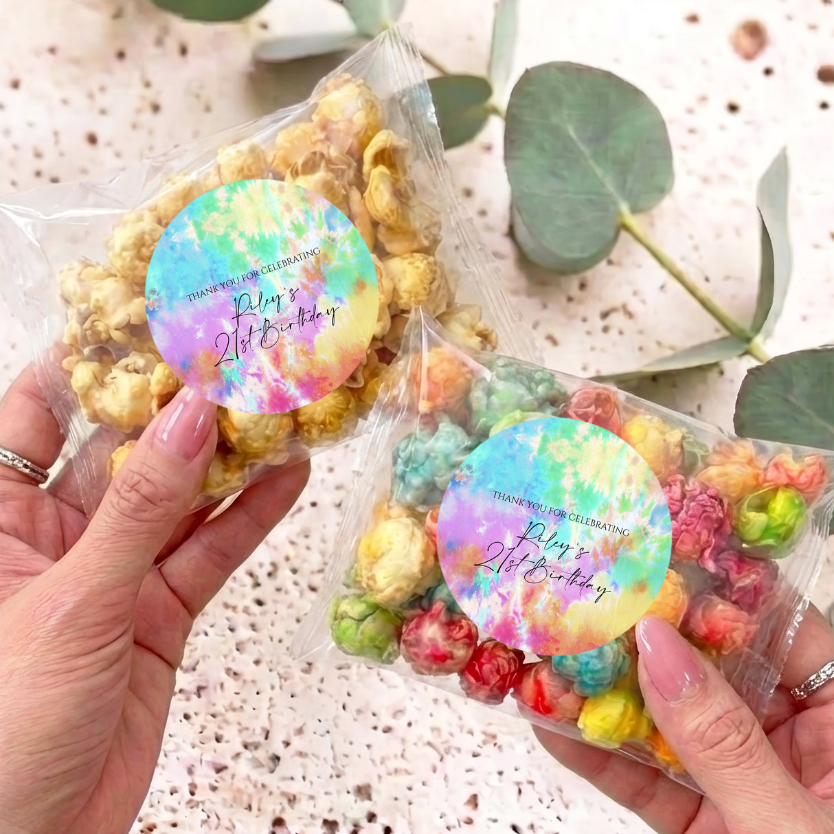 Personalised tie-dye popcorn bag, clear cellophane with circular birthday sticker and popcorn