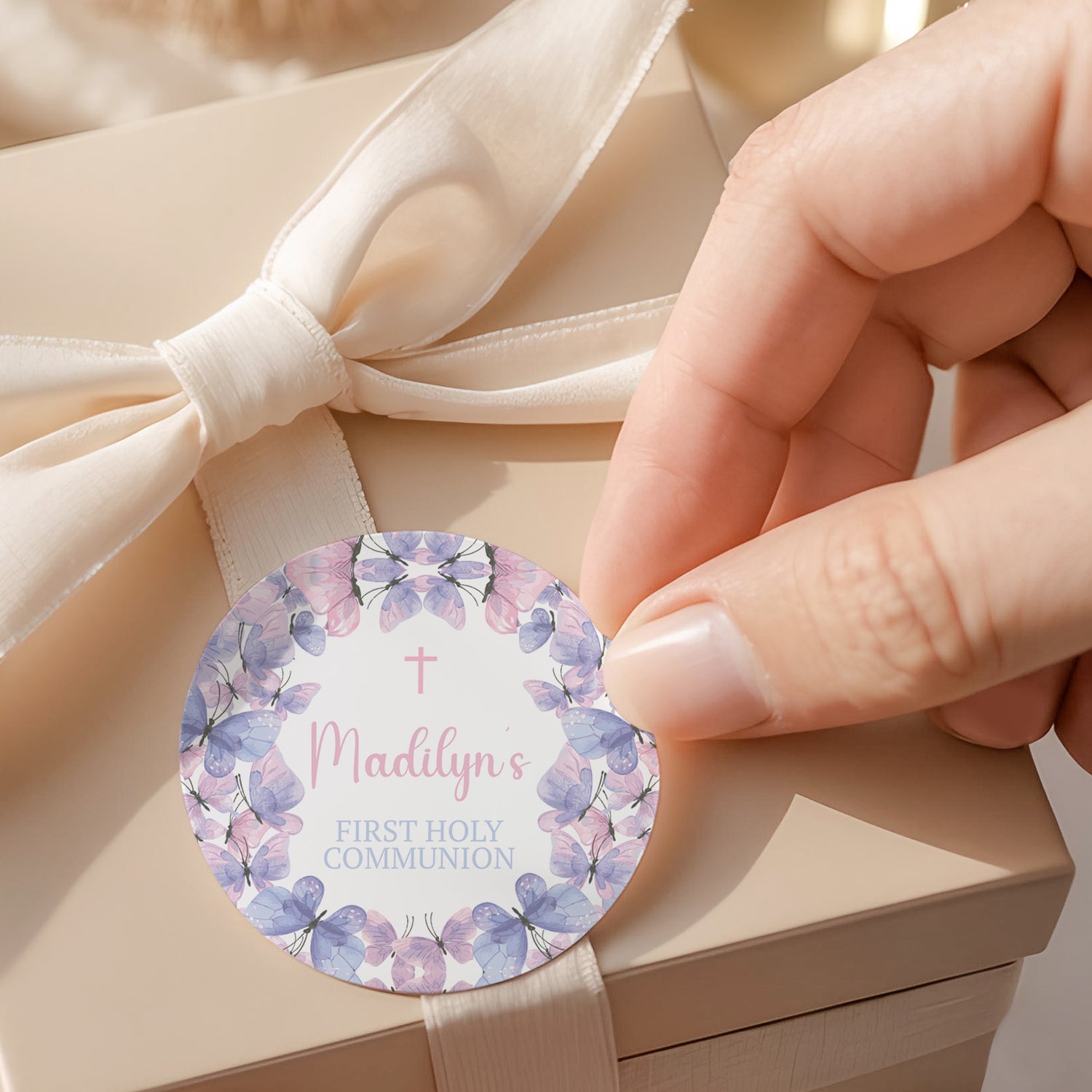 Round printed first holy communion label with purple butterflies and floral wreath