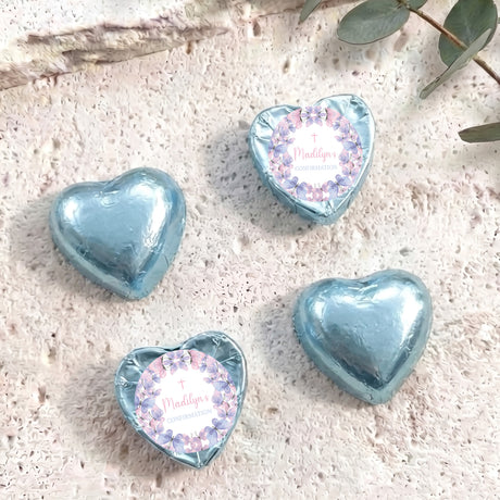 Personalised foil-covered chocolate hearts, light blue heart chocolates with floral window