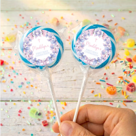 Personalised lollipops with butterfly wreath labels, pastel blue ribbon trim, two sticks