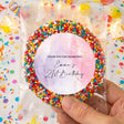 Clear bag with colorful sprinkles and pink label: “Emma's 21st Birthday”