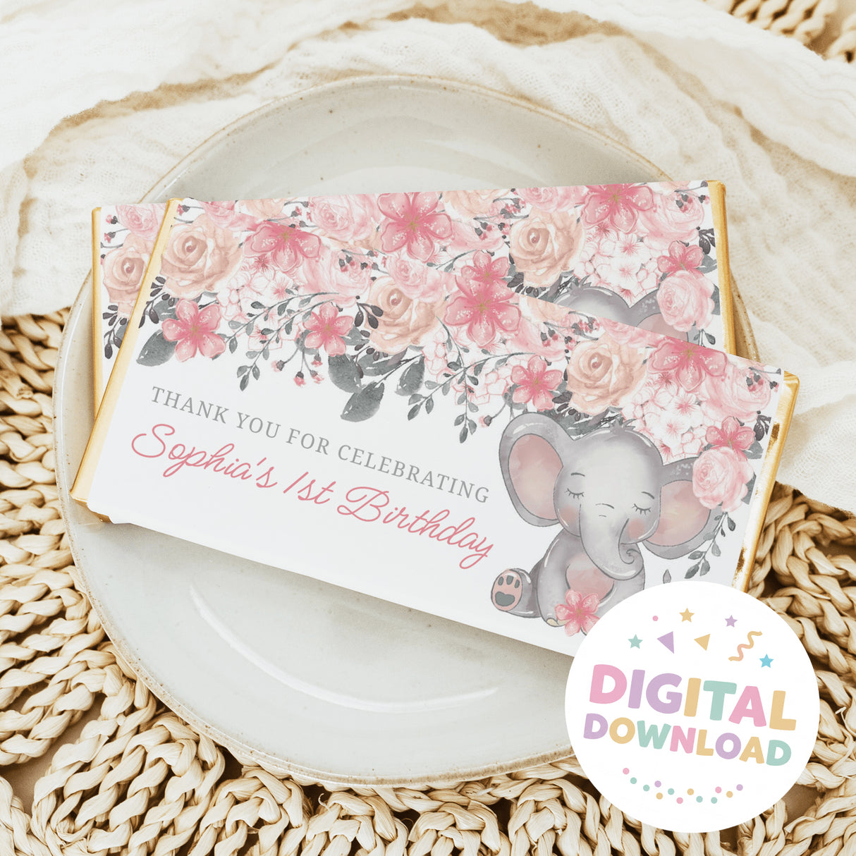 Chocolate bar wrapper with pink florals and elephant graphic, '1st Birthday' text