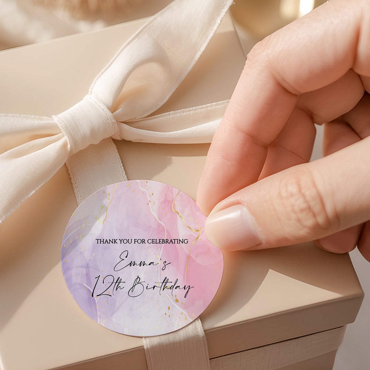 Round pink-purple marble birthday label: Thank you for celebrating, Emma's 12th Birthday