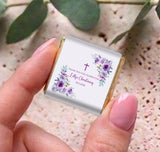 Personalised mini chocolates in silver foil with purple floral christening label and cross