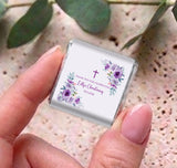 Personalised mini chocolates with purple floral christening label on silver foil