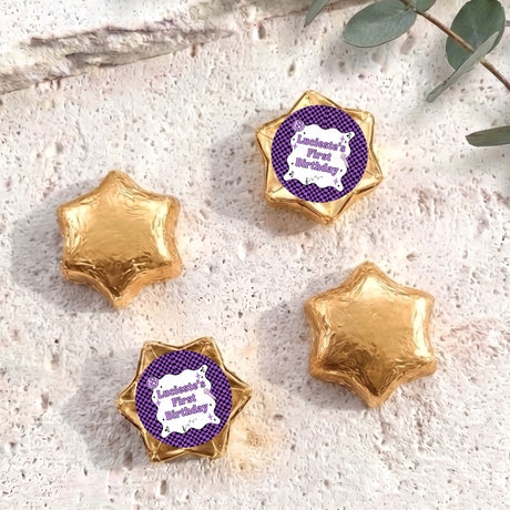 Foil-covered chocolate star candies in gold with personalised 'Birthday' topper