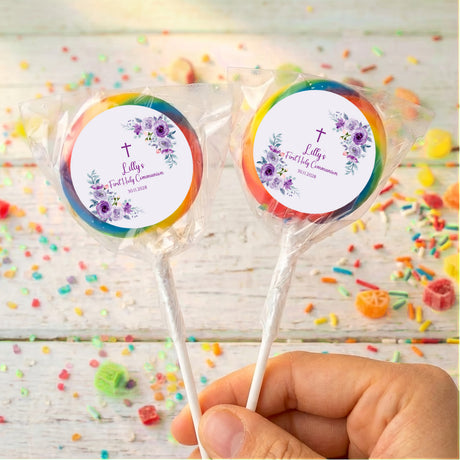 Rainbow-edge personalised lollipops with purple rose First Holy Communion labels