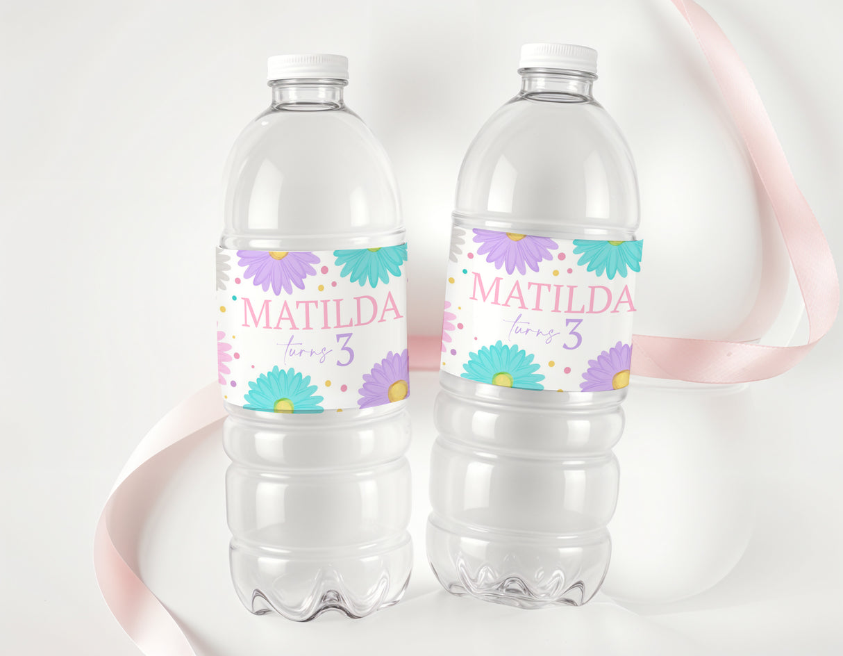 Personalised water bottle labels with pastel daisies, name MATILDA and age 3 on two bottles