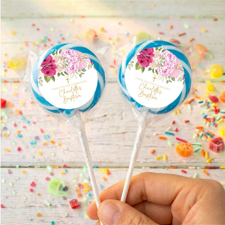 Blue rose baptism lollipops, clear wrappers, two personalized sticks with floral labels