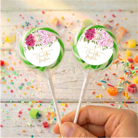 Green rose baptism lollipops, clear wrappers, two personalized sticks with floral labels