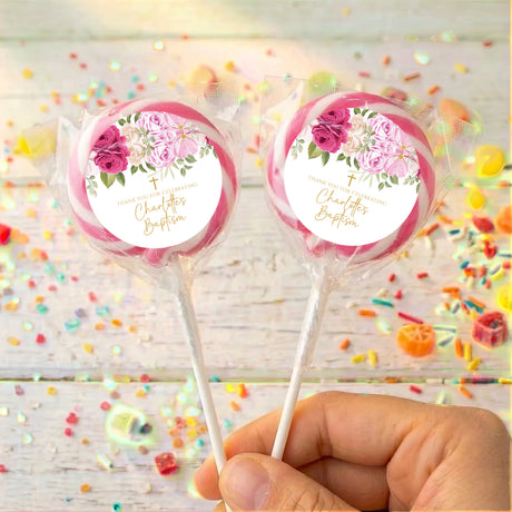 Pink rose baptism lollipops, clear wrappers, two personalized sticks with floral labels