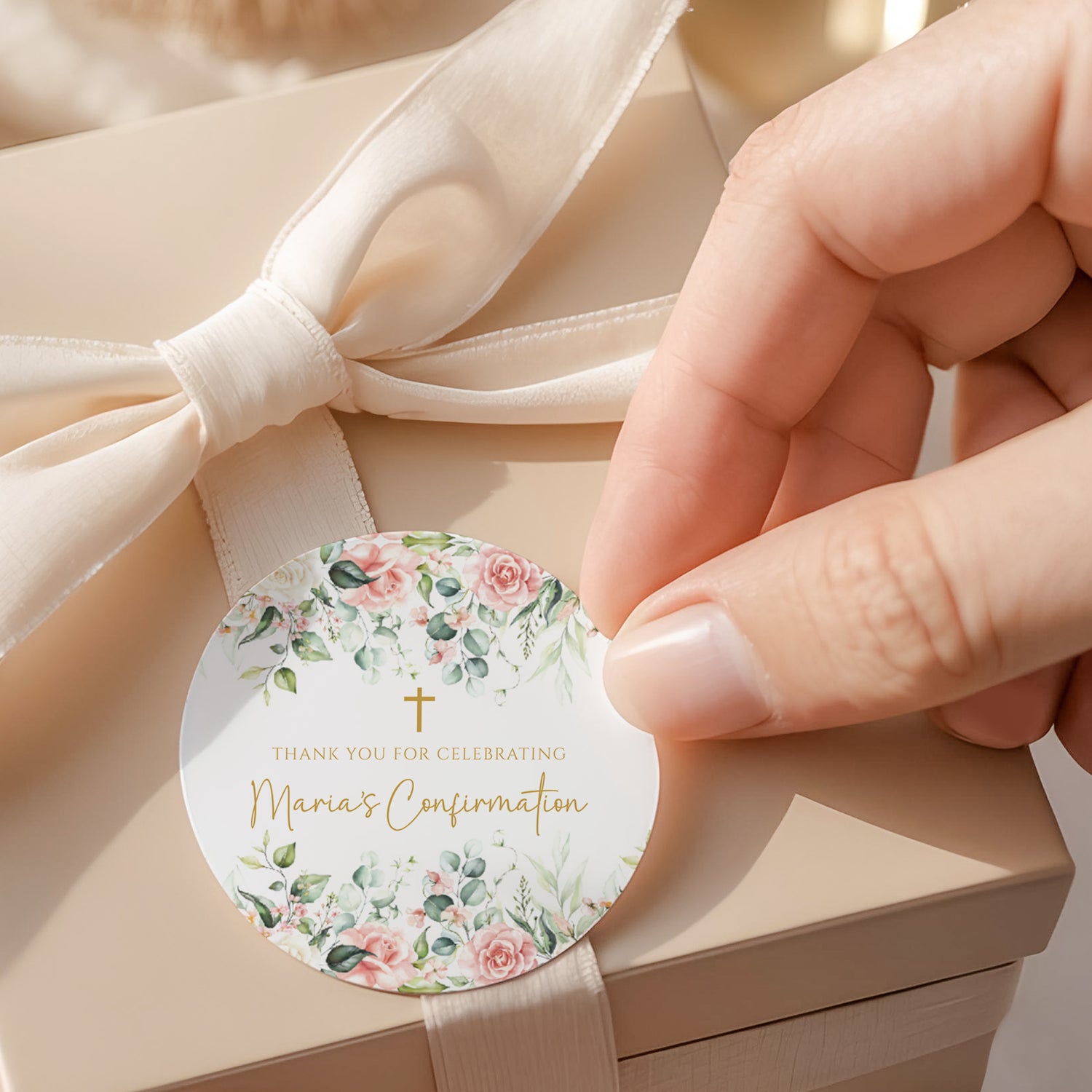Pink rose floral round confirmation label with greenery and gold cross