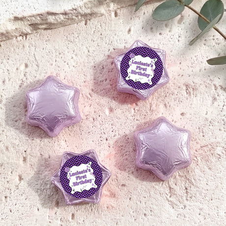 Foil-covered chocolate star candies in light purple with personalised 'Birthday' topper
