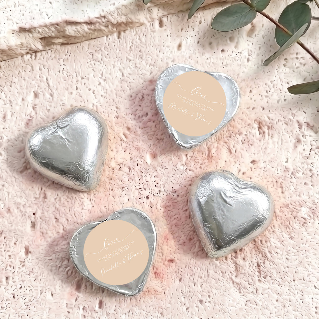 Foil-covered chocolate hearts, silver, with round personalised message label