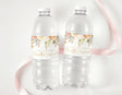 Peach floral confirmation water bottle labels on two clear plastic bottles