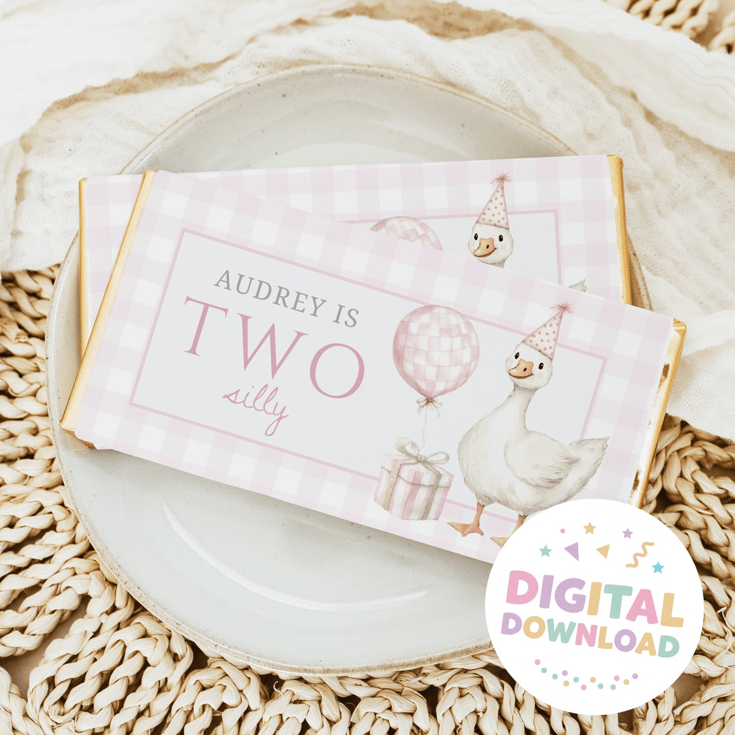 Pink plaid chocolate bar wrapper with two duck characters and birthday text