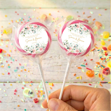 Personalised pink rose waterfall lollipops with floral label, names printed on circular sticker