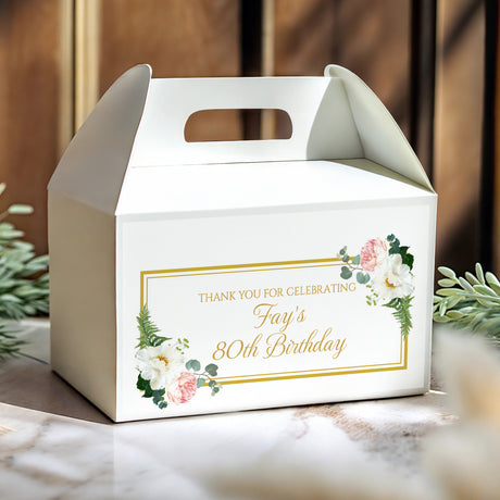 White gable favour box with gold frame, peony/fern florals, “Fay's 80th Birthday”