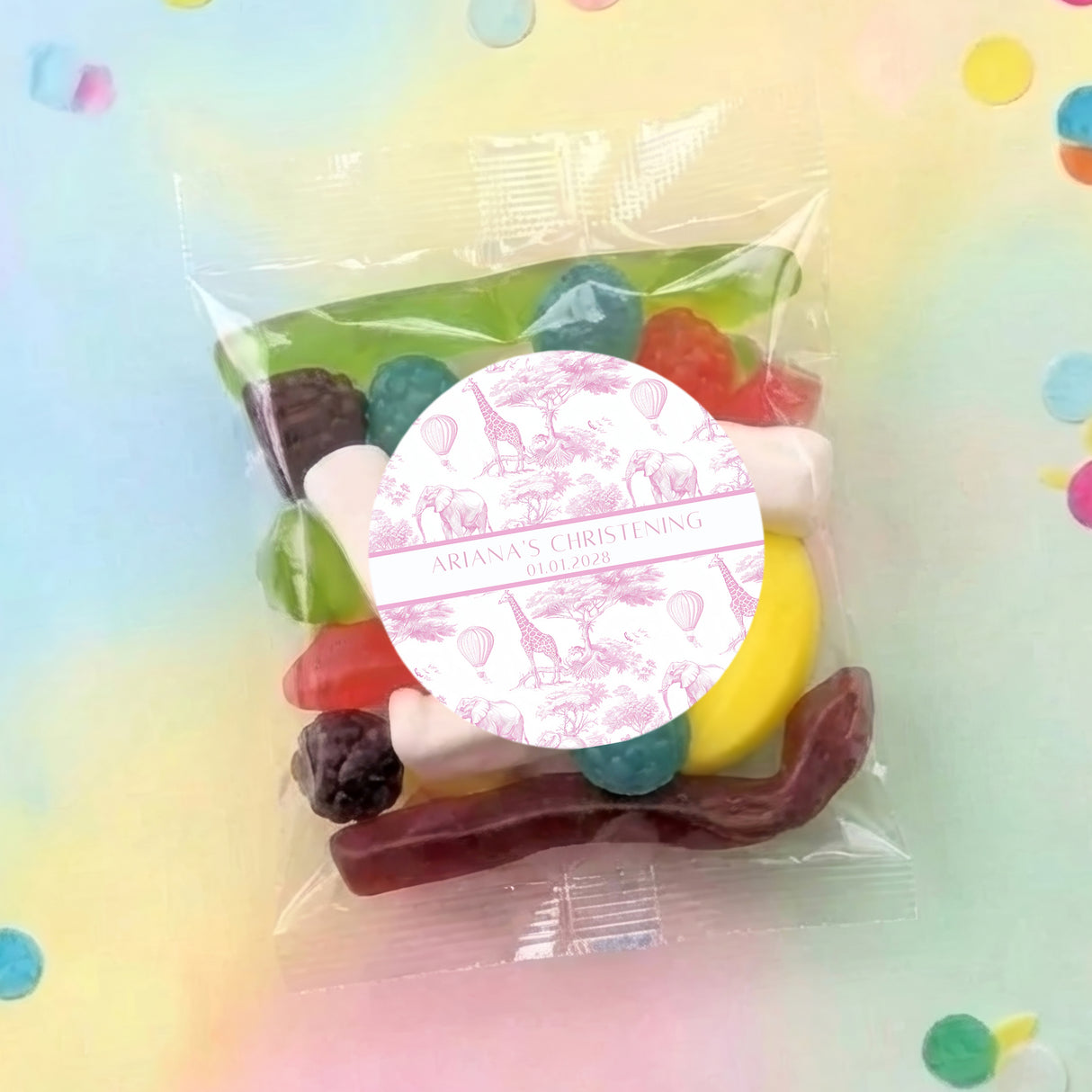 Personalised christening lolly bag with clear wrapper and pink animal print round label