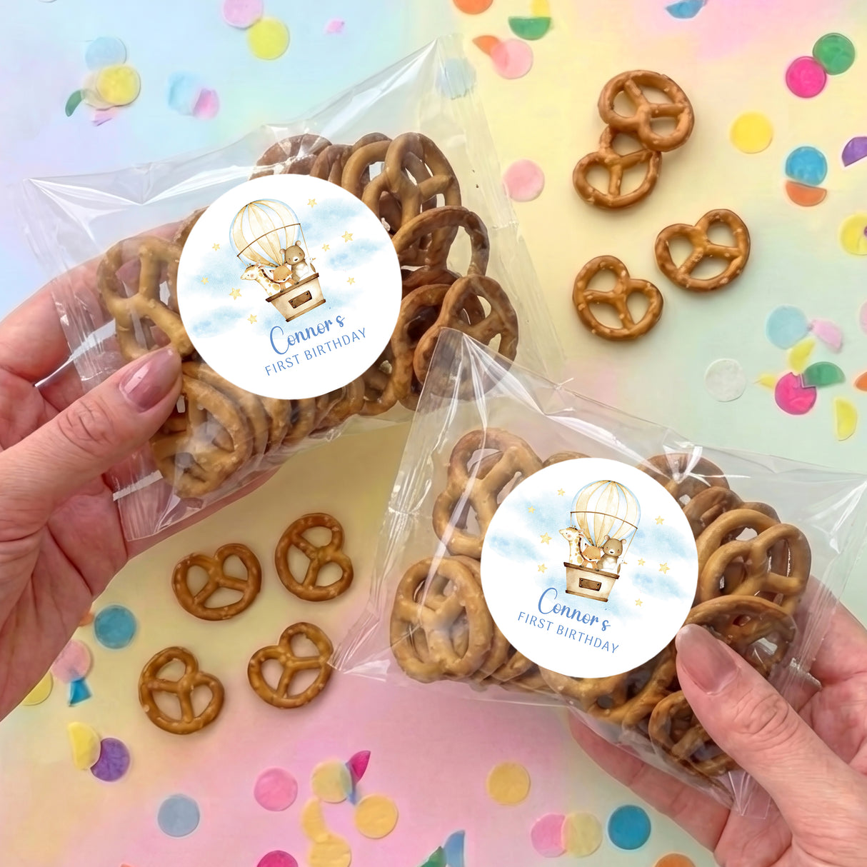 Personalised first birthday pretzel bags with hot-air-balloon animal sticker seals
