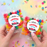 Two personalised jelly bean bags with race car labels, held hands; colorful beans