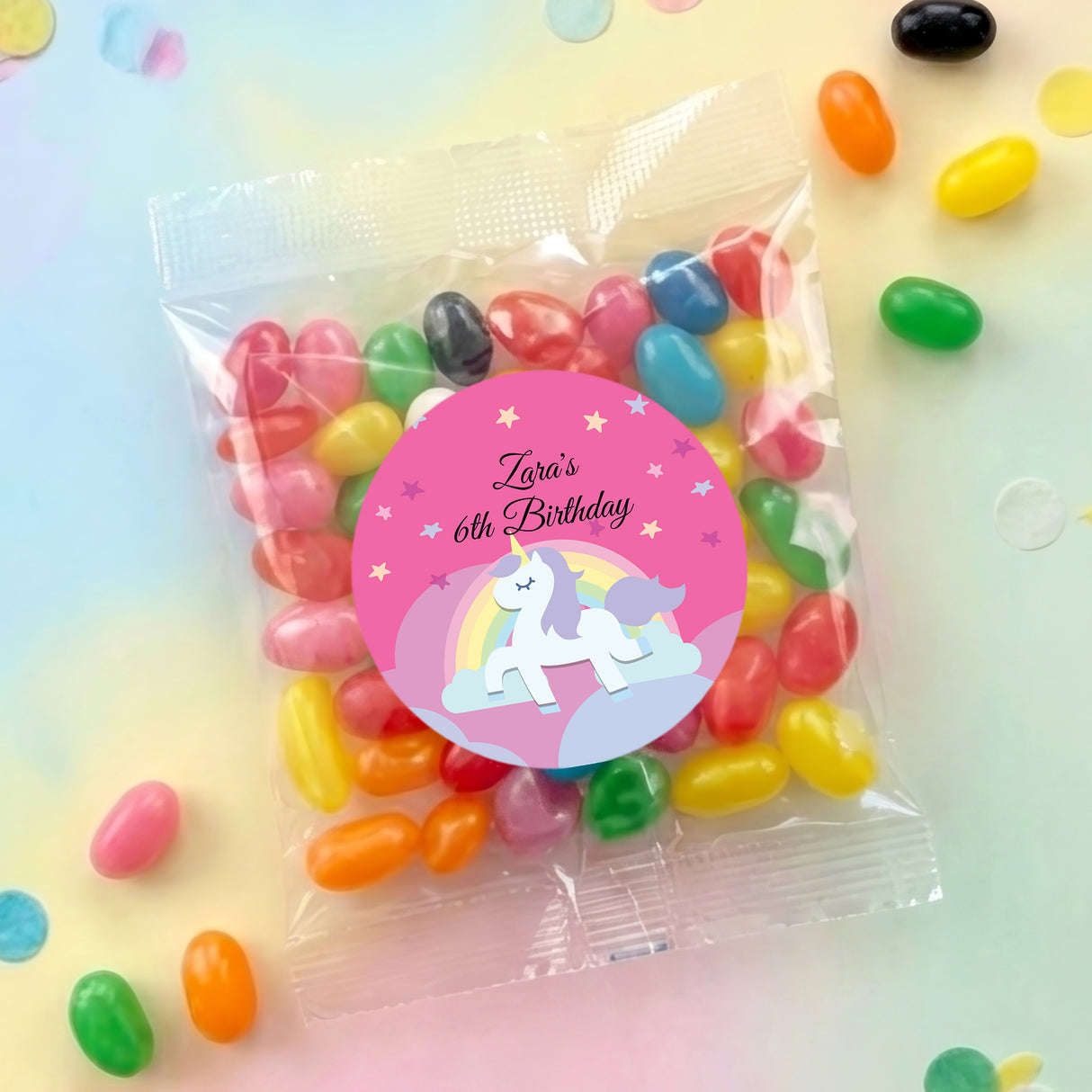 Personalised 6th birthday unicorn jelly bean bag with pink label and rainbow design