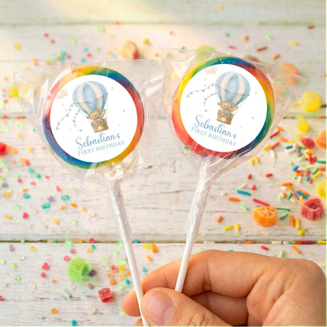 Personalised first birthday lollipops with hot air balloon labels and rainbow circle border