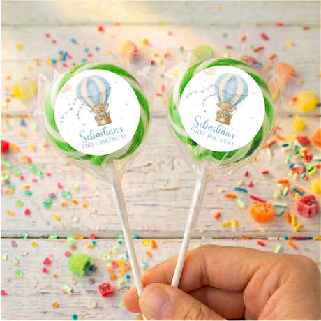 Personalised first birthday lollipops with hot air balloon labels and green circle border
