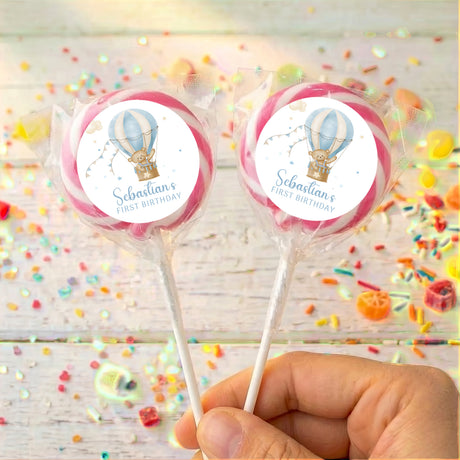 Personalised first birthday lollipops with hot air balloon labels and pink circle border
